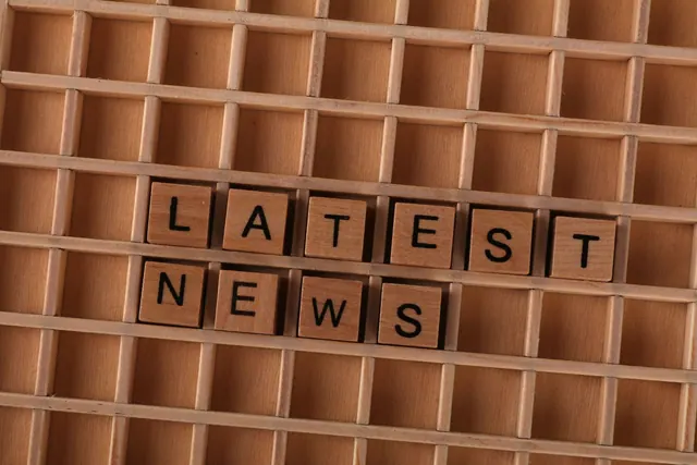 Wooden letter blocks spelling Latest News on a grid background, ideal for media themes. Health news alert problems and practical fixes