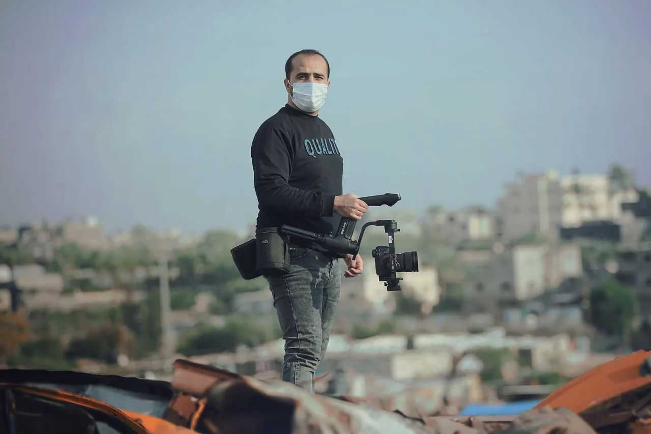 man, mask, journalist, camera, camera man, videographer, videography, face mask, new normal, coronavirus, pandemic, press, videographer, videographer, videographer, videography, videography, videography, videography, videography. How to verify a conflict claim before publication