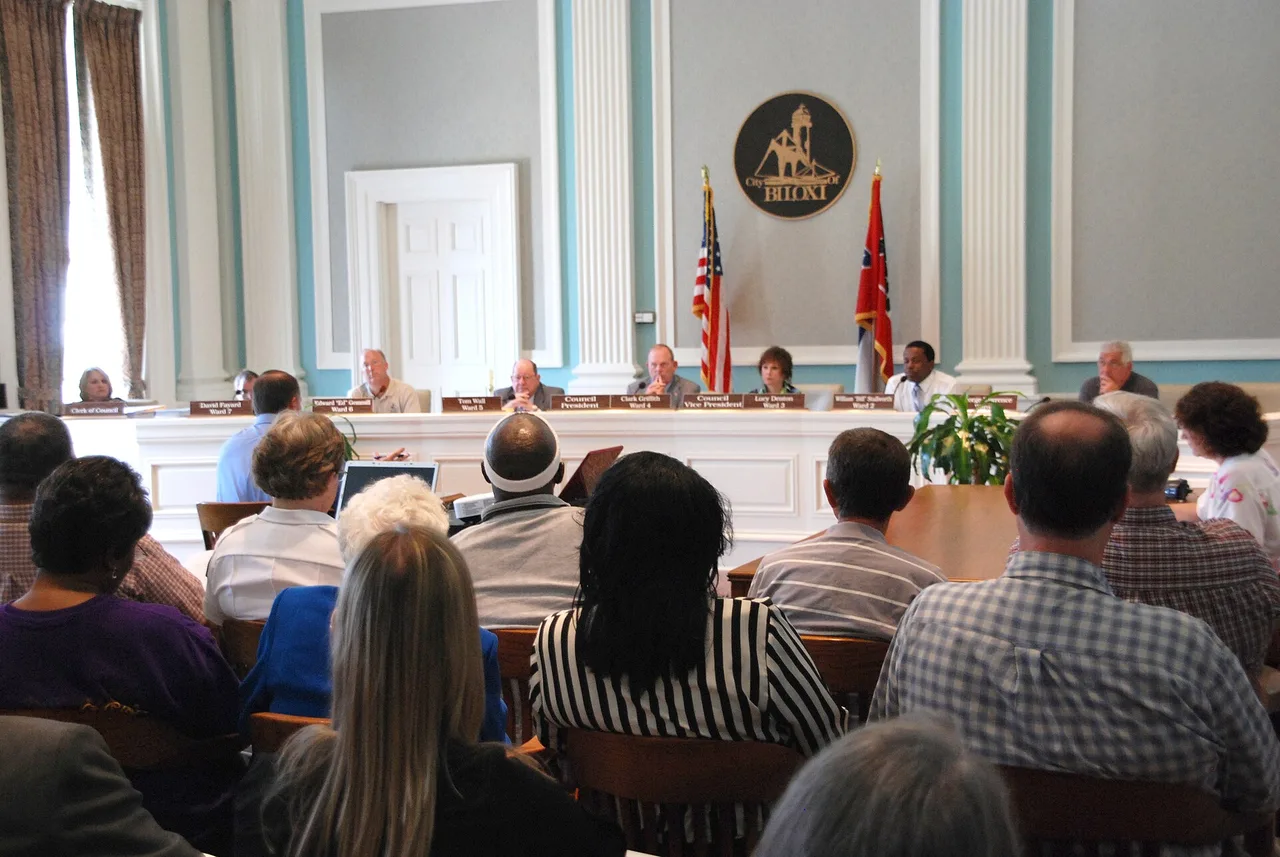 Residents attending a Biloxi City Council meeting